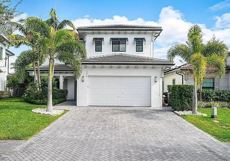 Garage before renovation with an older garage door